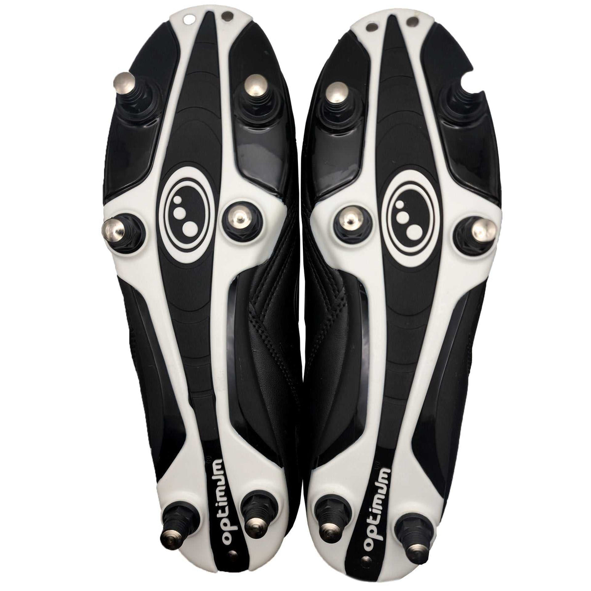 Underside of black and white Optimum Razor football boots showing six screw-in studs, on white - Optimum