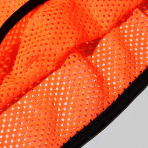 Close-up of orange Optimum training bib mesh fabric with black trim showing perforated texture - Optimum