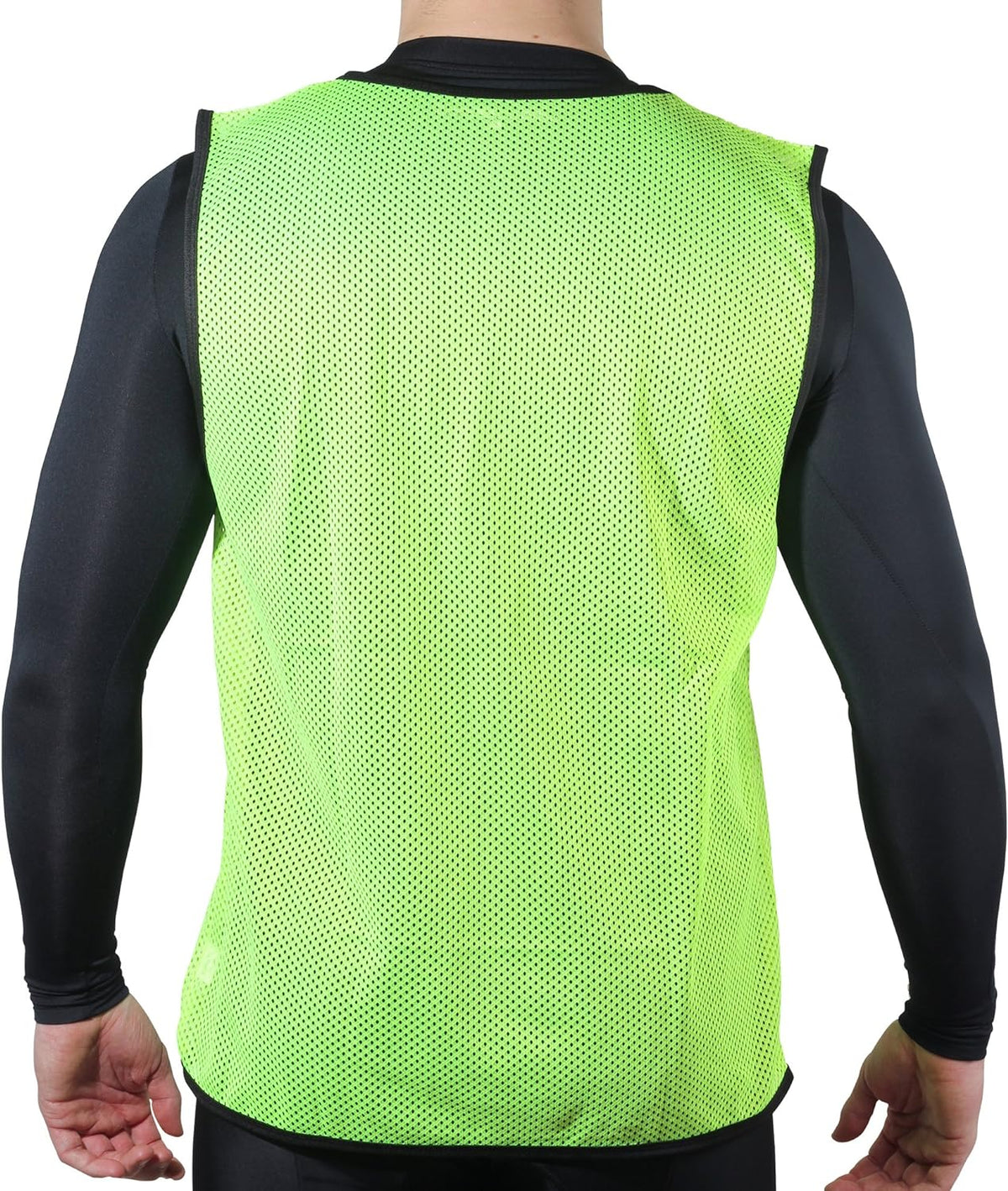 Fluorescent yellow mesh Optimum training bib worn by a man over black top, rear view, on white - Optimum